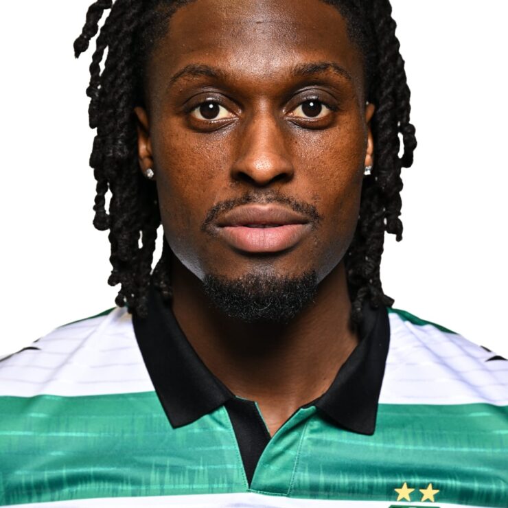 Shamrock Rovers football player in team jersey, close-up portrait.