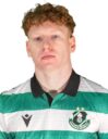 Shamrock Rovers football player in green and white kit with club crest.