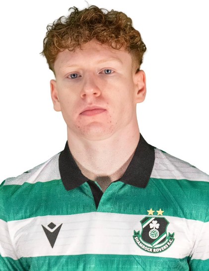 Shamrock Rovers football player in green and white kit with club crest.