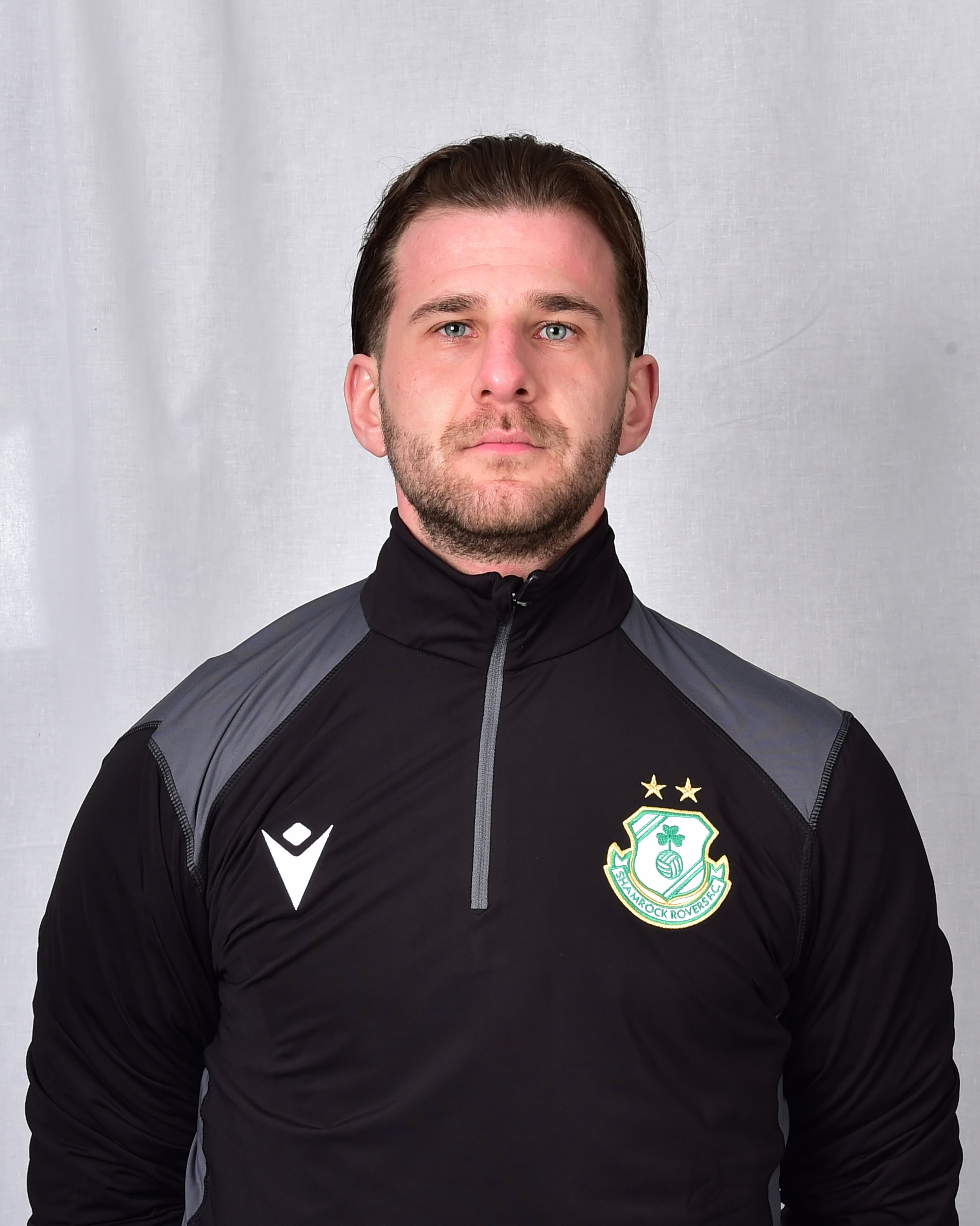 Josh Hotca in Shamrock Rovers training kit, facing forward.