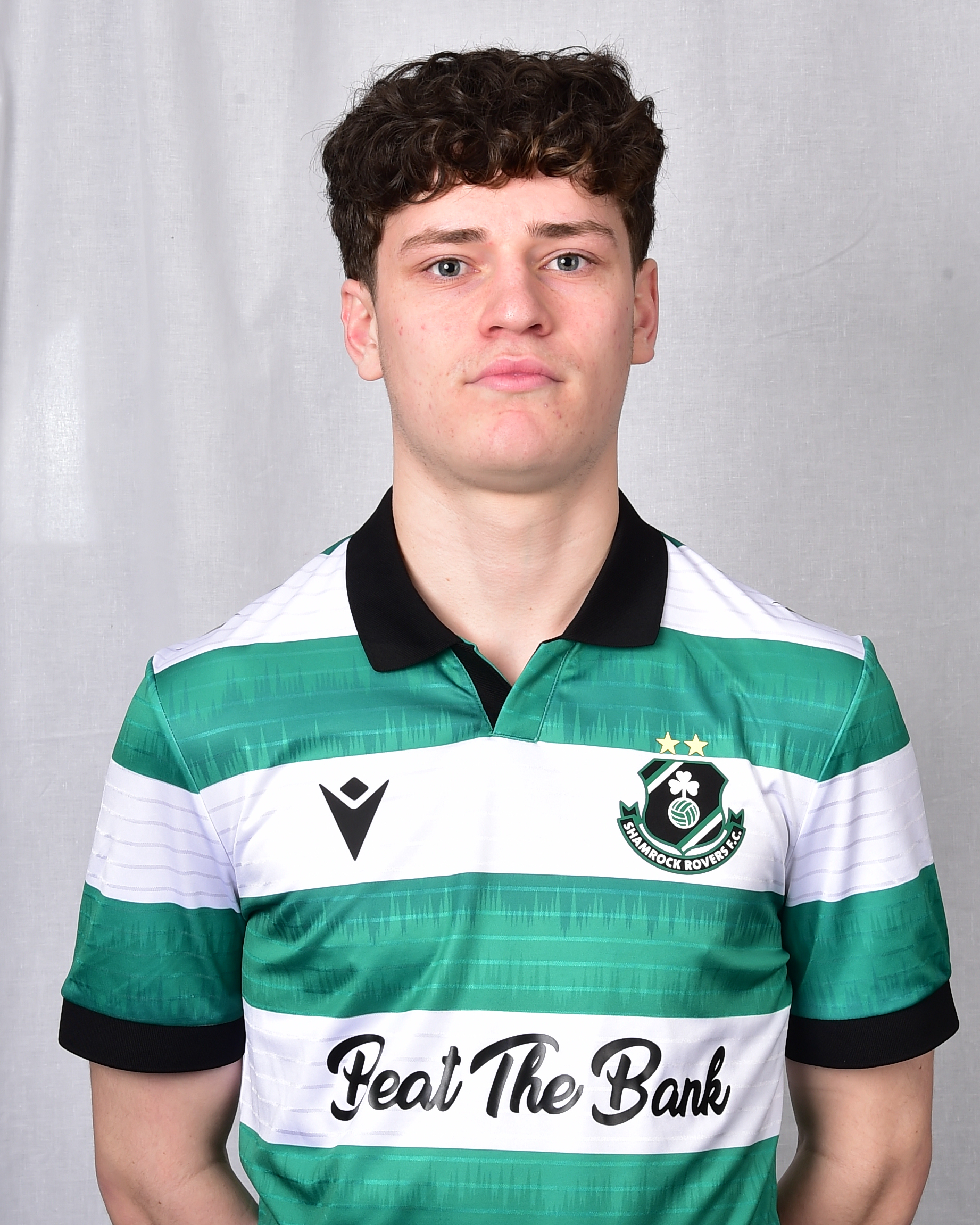 Adam Byrne in Shamrock Rovers jersey, football club player portrait.