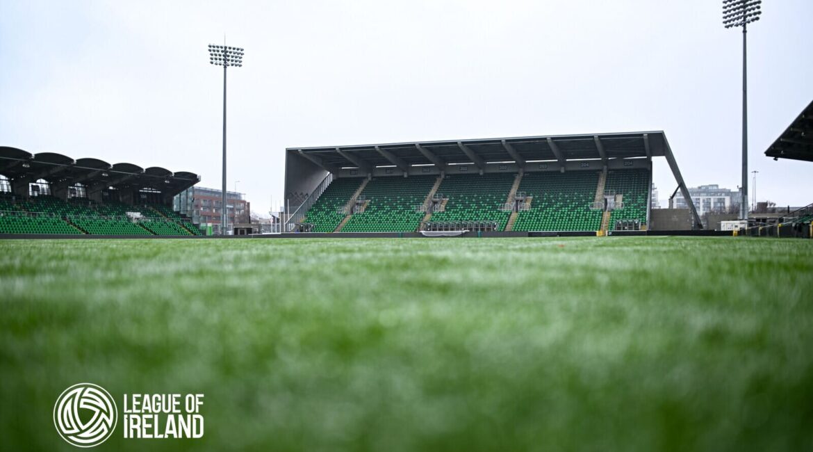 Shamrock Rovers stadium with green seats and floodlights in Dublin, Ireland.