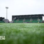 Shamrock Rovers stadium with green seats and floodlights in Dublin, Ireland.
