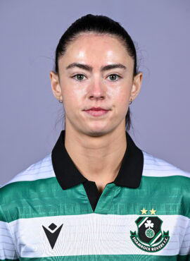 Female footballer in Shamrock Rovers kit.