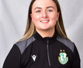 Female football player in Shamrock Rovers kit.