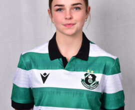 Female football player in Shamrock Rovers jersey.