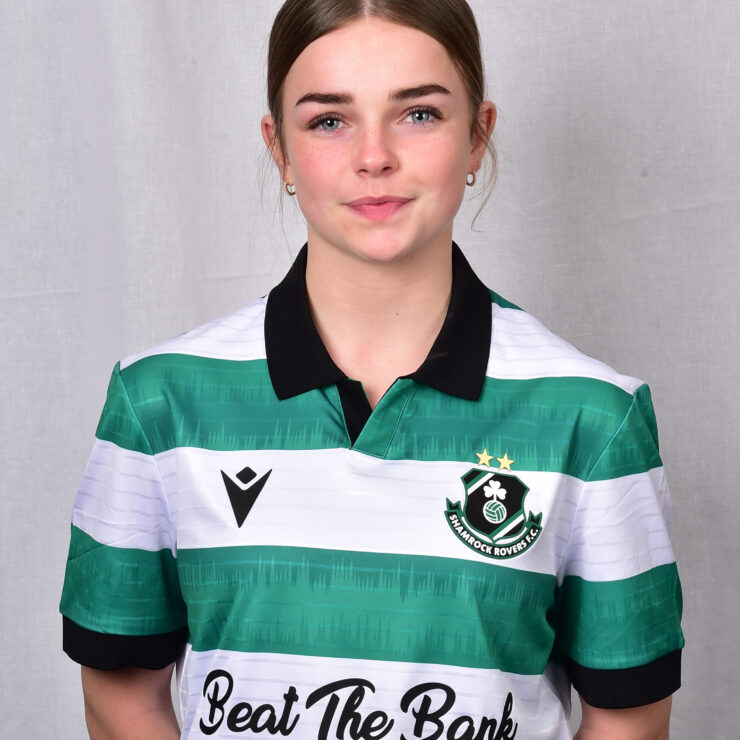 Female football player in Shamrock Rovers jersey.