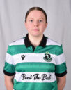 Female Shamrock Rovers football player in team jersey.