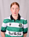 Female footballer in Shamrock Rovers jersey, showcasing team pride and sportsmanship.