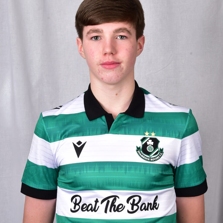 Young Shamrock Rovers player in green and white jersey, facing forward.
