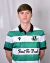 Young Shamrock Rovers football player in green and white jersey.