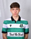 Young Shamrock Rovers player in green and white jersey, facing front.