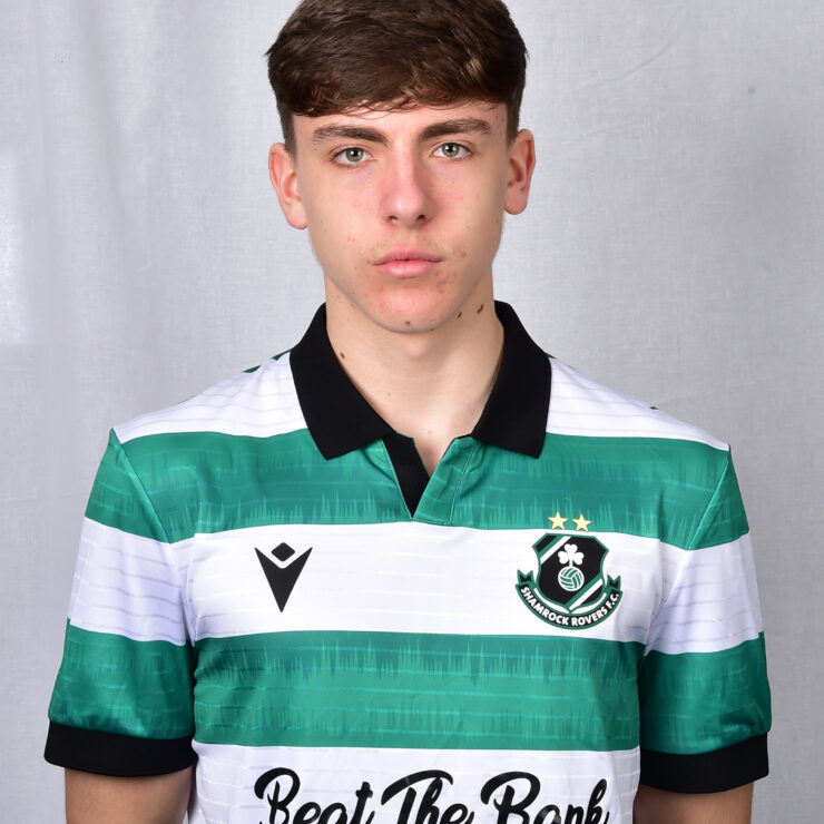 Young Shamrock Rovers player in green and white jersey, facing front.