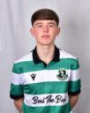Player in Shamrock Rovers football kit, showcasing team colours and logo.