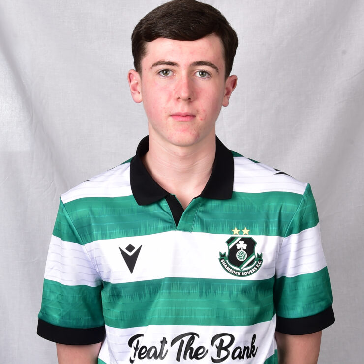 Young Shamrock Rovers player in green and white striped jersey.