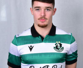 Player in Shamrock Rovers jersey, standing against a neutral background.