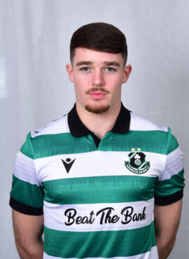 Player in Shamrock Rovers jersey, standing against a neutral background.