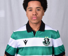 Young Shamrock Rovers football player in green and white jersey.