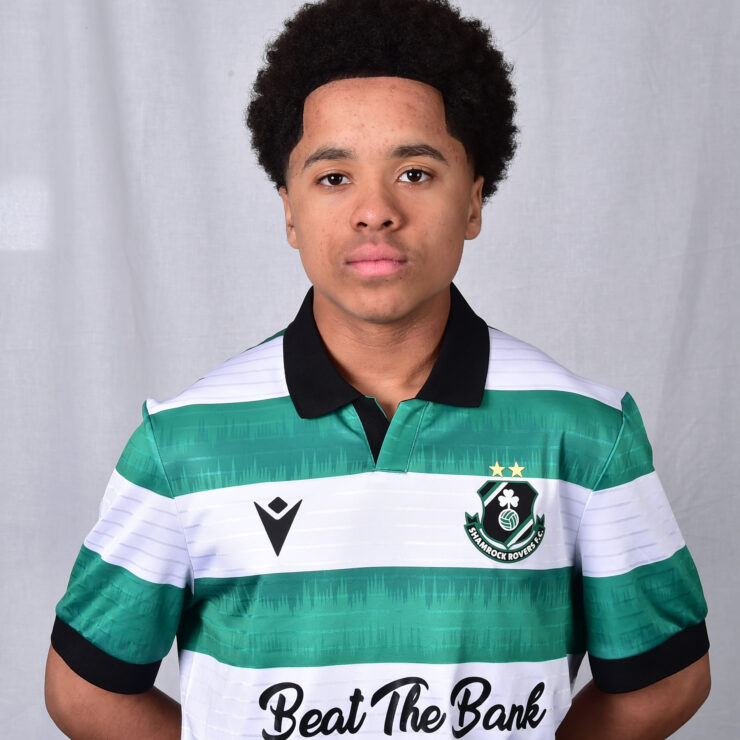 Young Shamrock Rovers football player in green and white jersey.