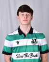Young Shamrock Rovers football player in green and white kit.