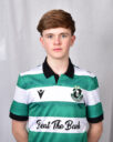 Young Shamrock Rovers player in green and white striped jersey.