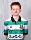 Young Shamrock Rovers player in team jersey.