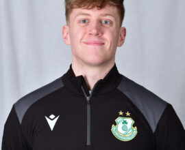 Darragh Connolly wearing Shamrock Rovers football kit, smiling.