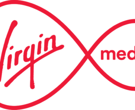 Shamrock Rovers players celebrating on the pitch during a match.