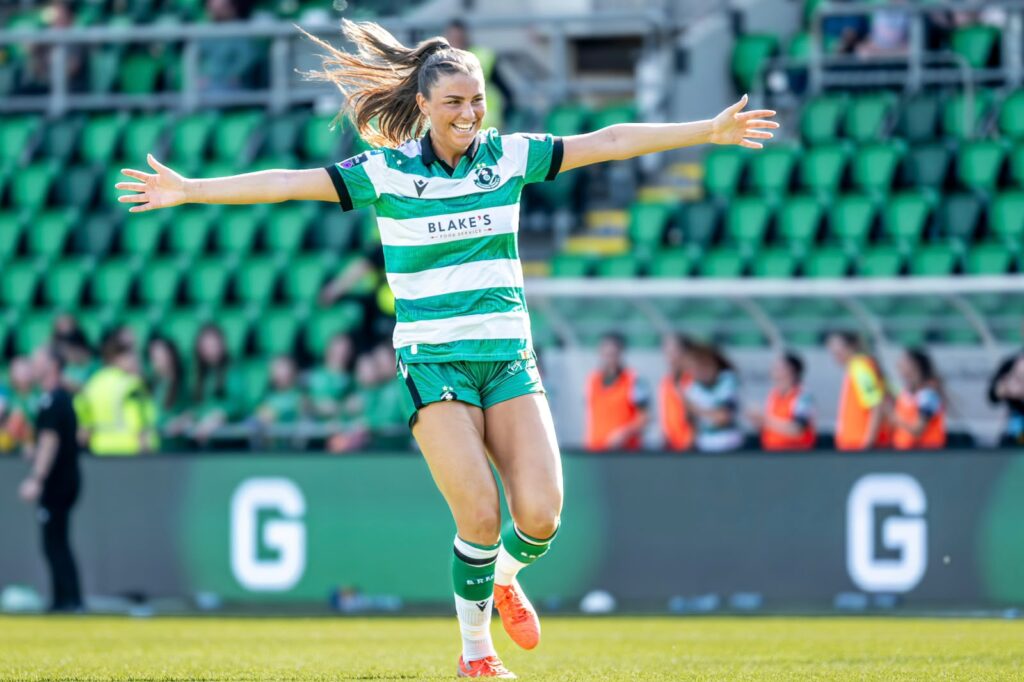 Shamrock Rovers female player celebrating on the field during a match.